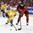 BUFFALO, NEW YORK - JANUARY 5: Sweden's Lias Andersson #24 and Canada's Brett Howden #21 battle for the puck during gold medal game action at the 2018 IIHF World Junior Championship. (Photo by Matt Zambonin/HHOF-IIHF Images)

